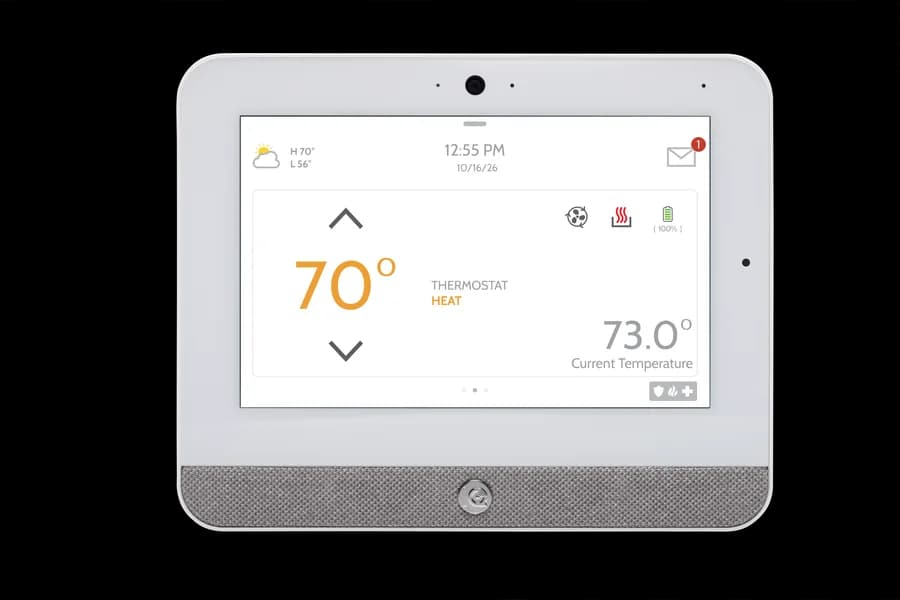 IQ Panel 5 touchscreen showing thermostat control